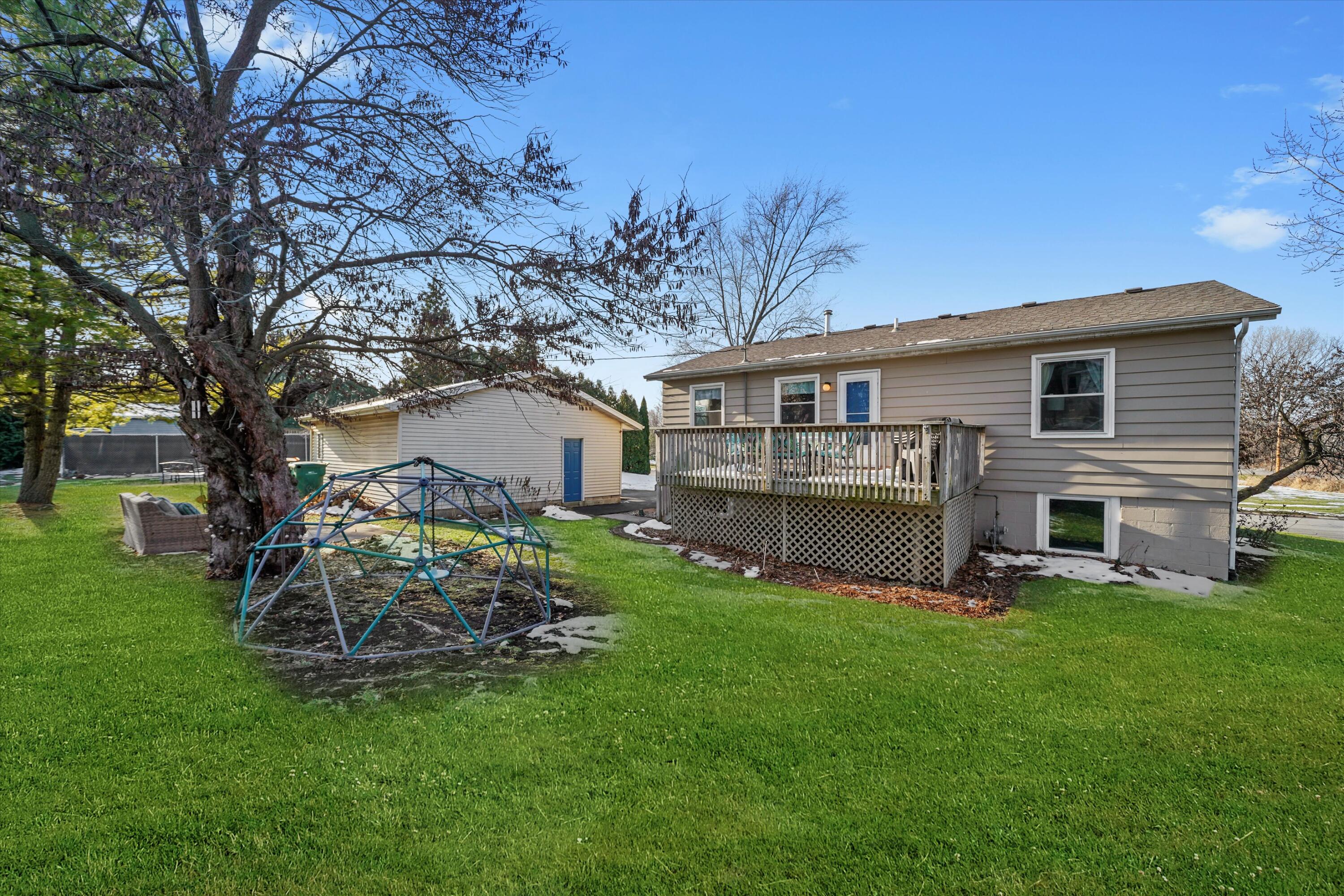 7315 Taney Place Merrillville, IN 46410 - Photo 18 of 26 a view of a house with a yard porch and sitting area