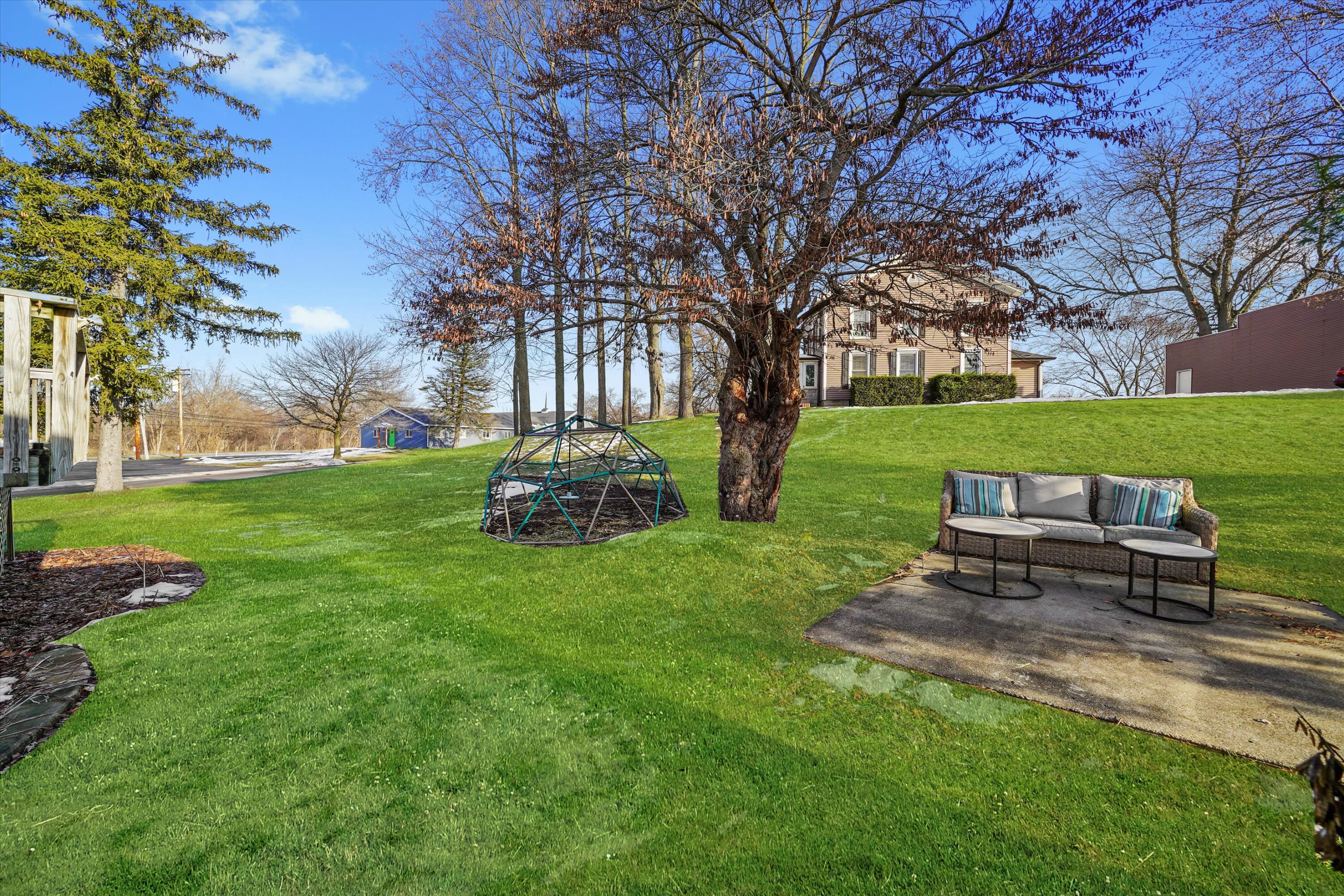 7315 Taney Place Merrillville, IN 46410 - Photo 20 of 26 a view of a park with bench and bench