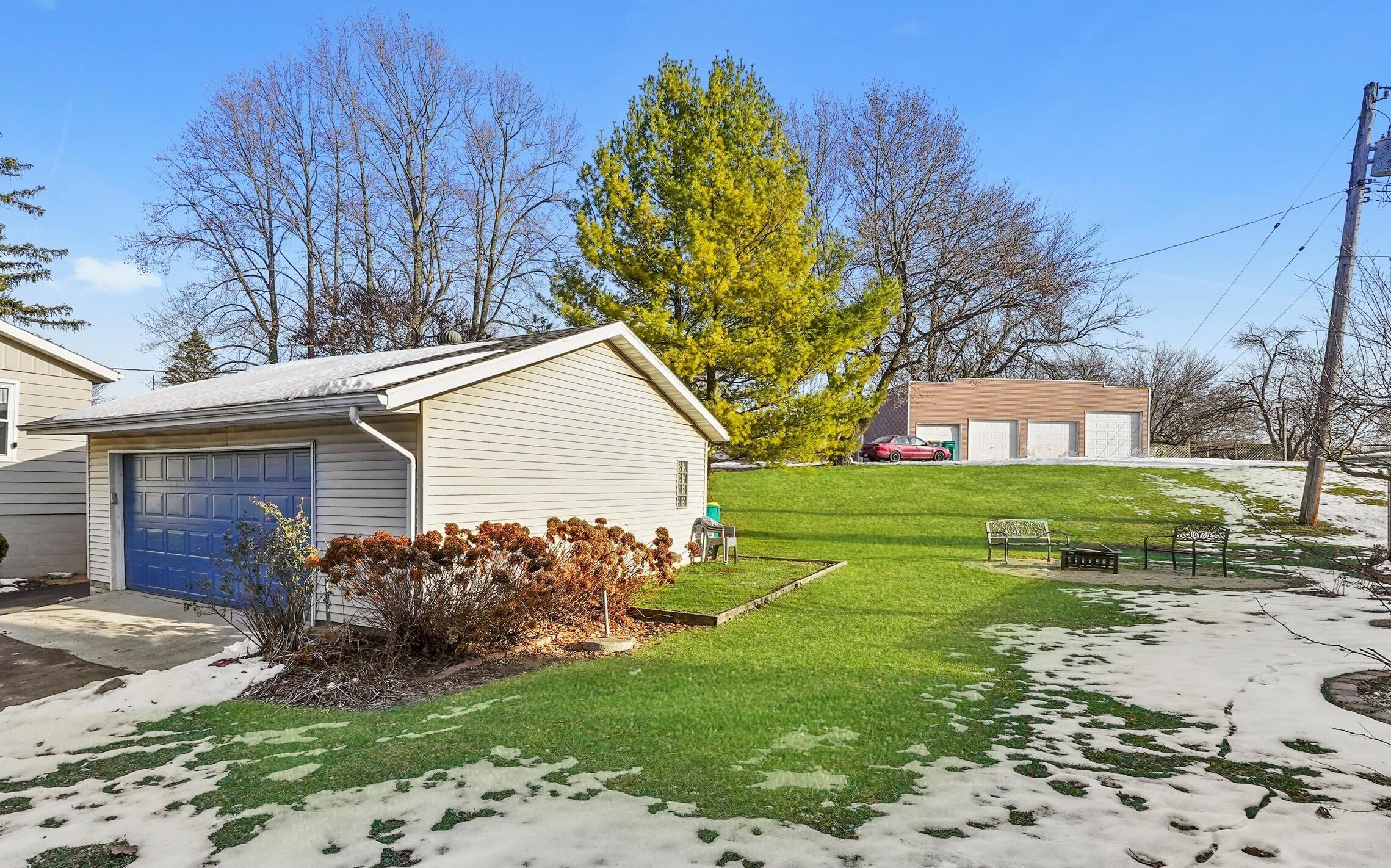 7315 Taney Place Merrillville, IN 46410 - Photo 21 of 26 a view of a house with a yard