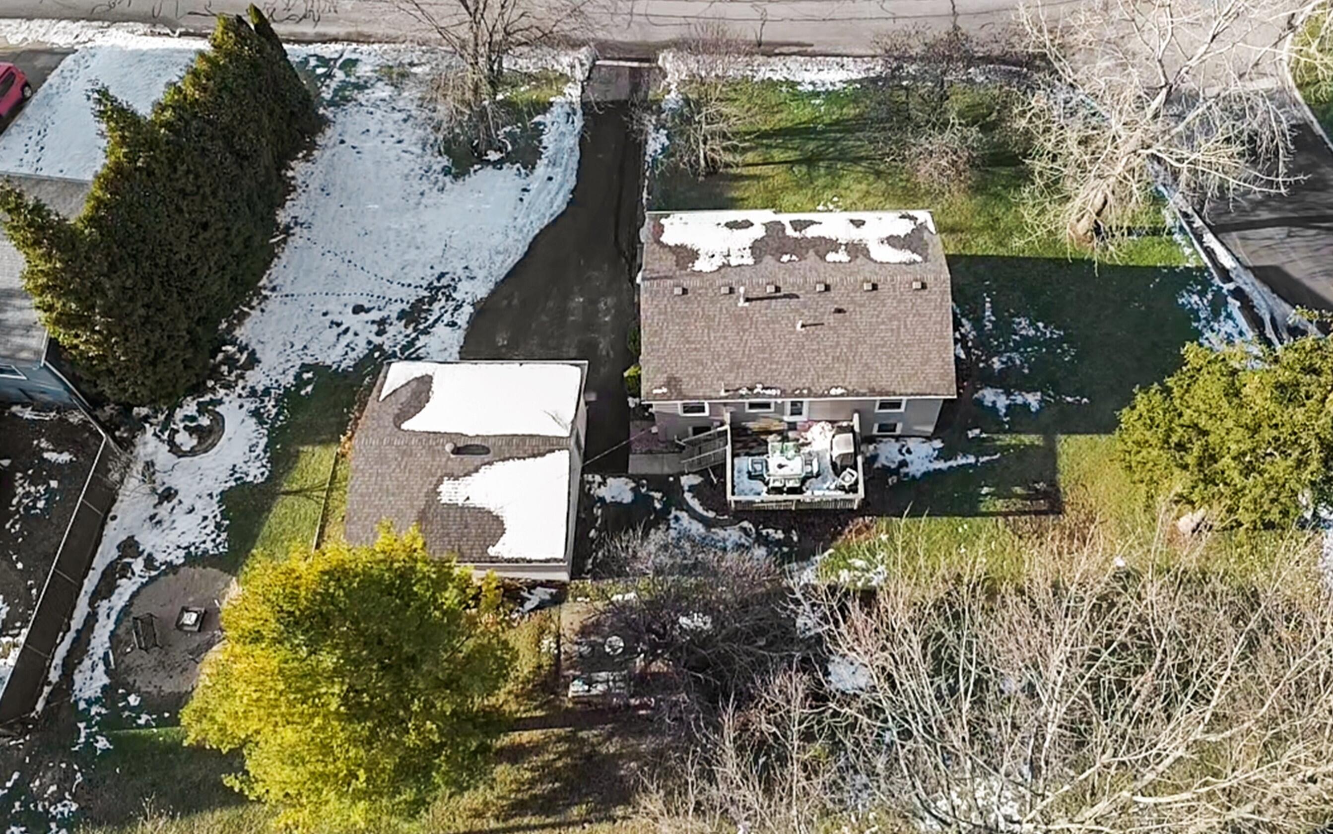 7315 Taney Place Merrillville, IN 46410 - Photo 26 of 26 an aerial view of a house with a yard and garden