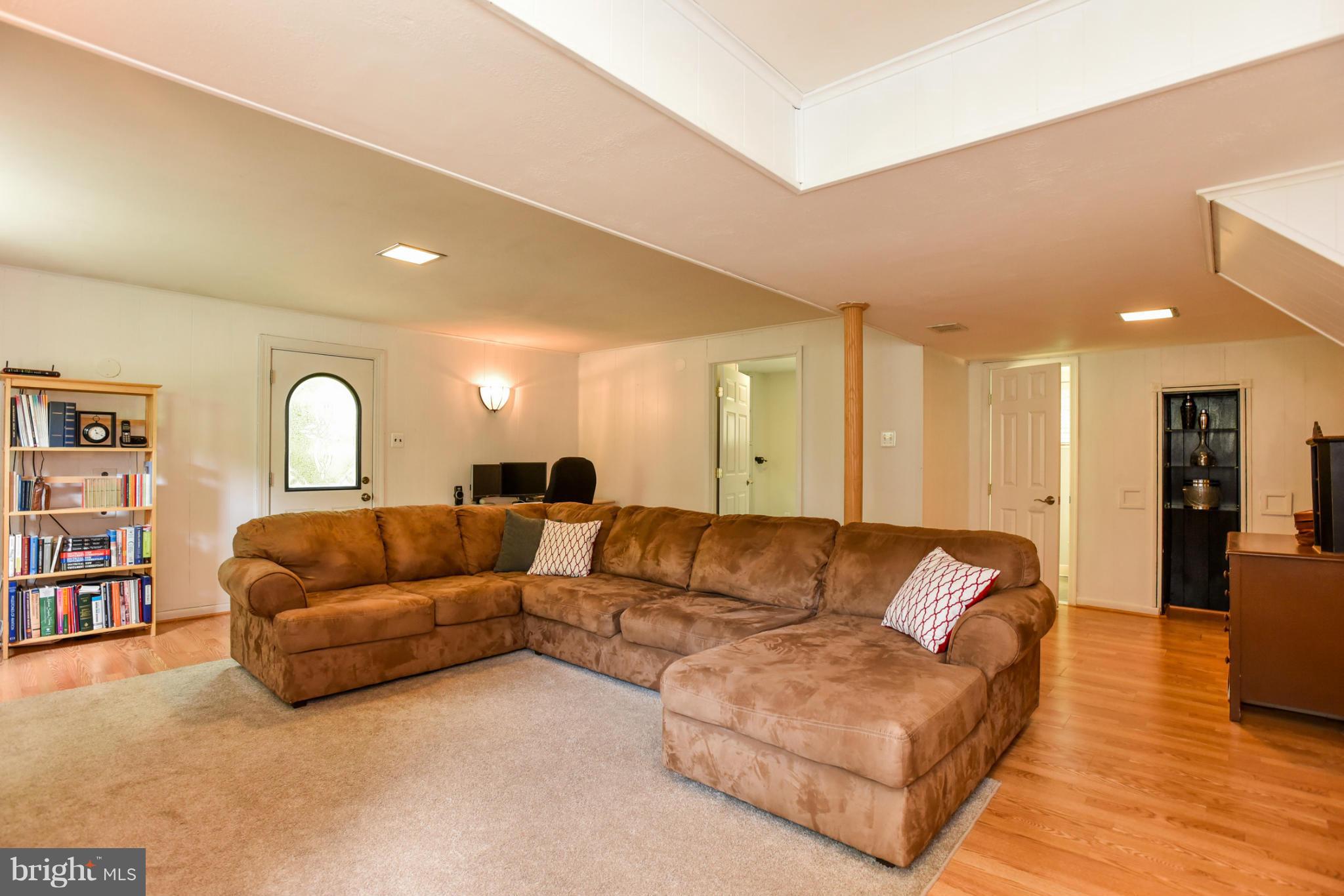5614 Heming Avenue Springfield, VA 22151 - Photo 17 of 30 a living room with furniture and a couch