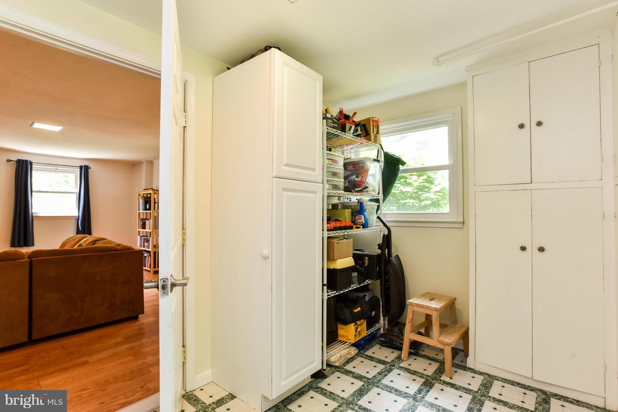 5614 Heming Avenue Springfield, VA 22151 - Photo 19 of 30 a view of a hallway with workspace and a window