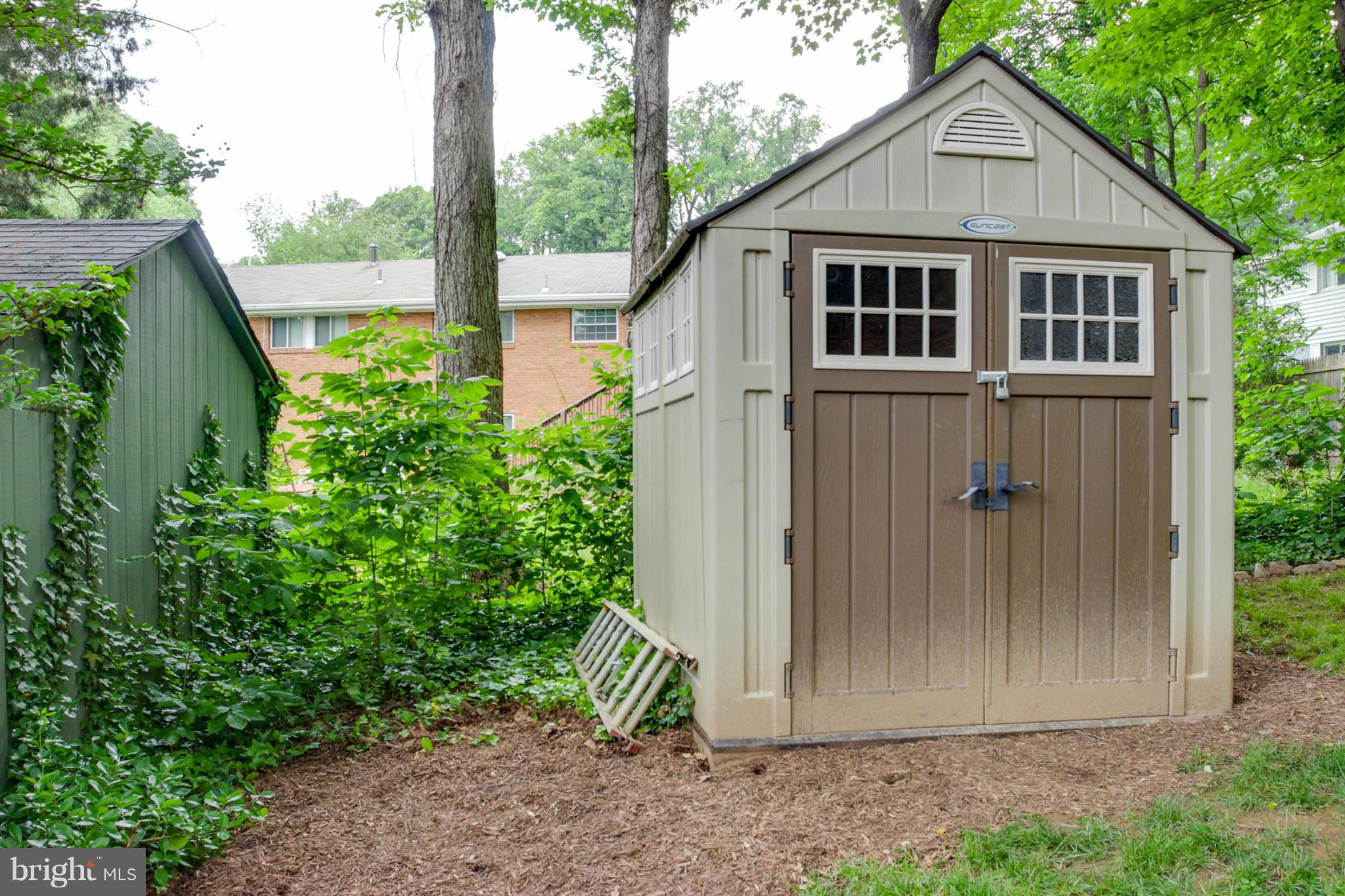 5614 Heming Avenue Springfield, VA 22151 - Photo 26 of 30 a view of a small house with yard and plants