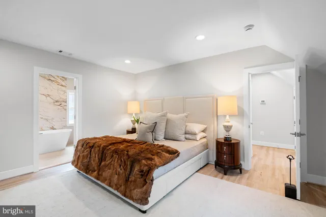 a bathroom with a toilet and shower