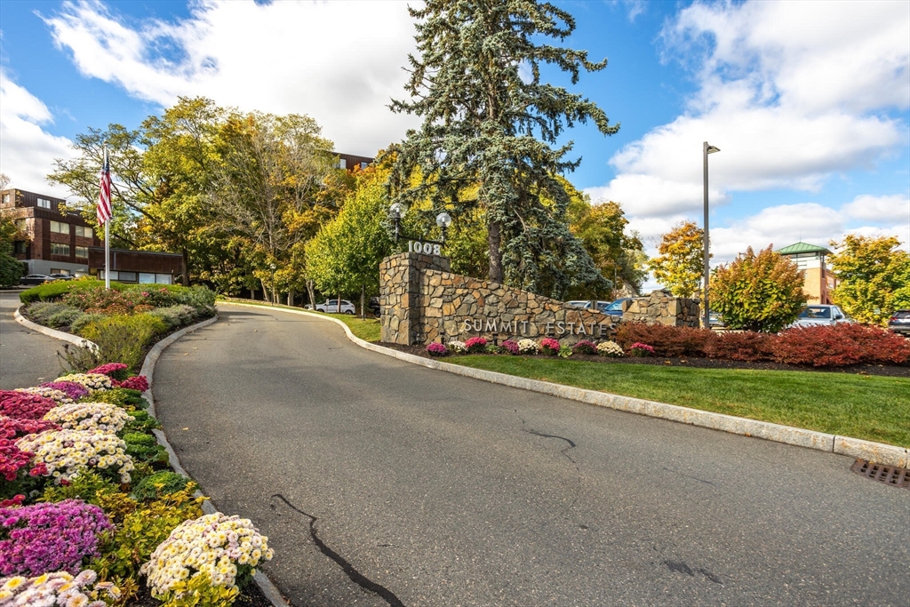 1008 Paradise Road, Unit 2R Swampscott, MA 01907 - Photo 2 of 18 a view of a street with a park