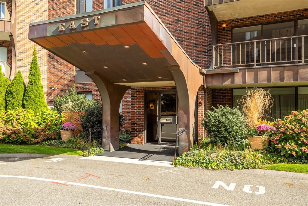 1008 Paradise Road, Unit 2R Swampscott, MA 01907 - Photo 3 of 18 a view of a house with a street