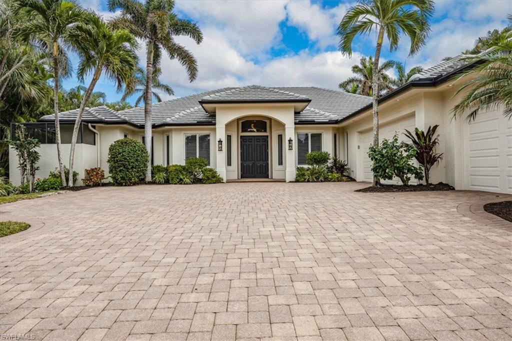 3110 Crayton Road Naples, FL 34103 - Photo 1 of 38 Front of residence.