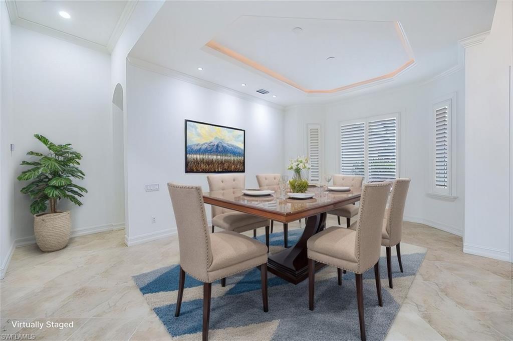 3110 Crayton Road Naples, FL 34103 - Photo 12 of 38 Virtually Staged - Dining room off the great room (not shown) across from the front door and the den.