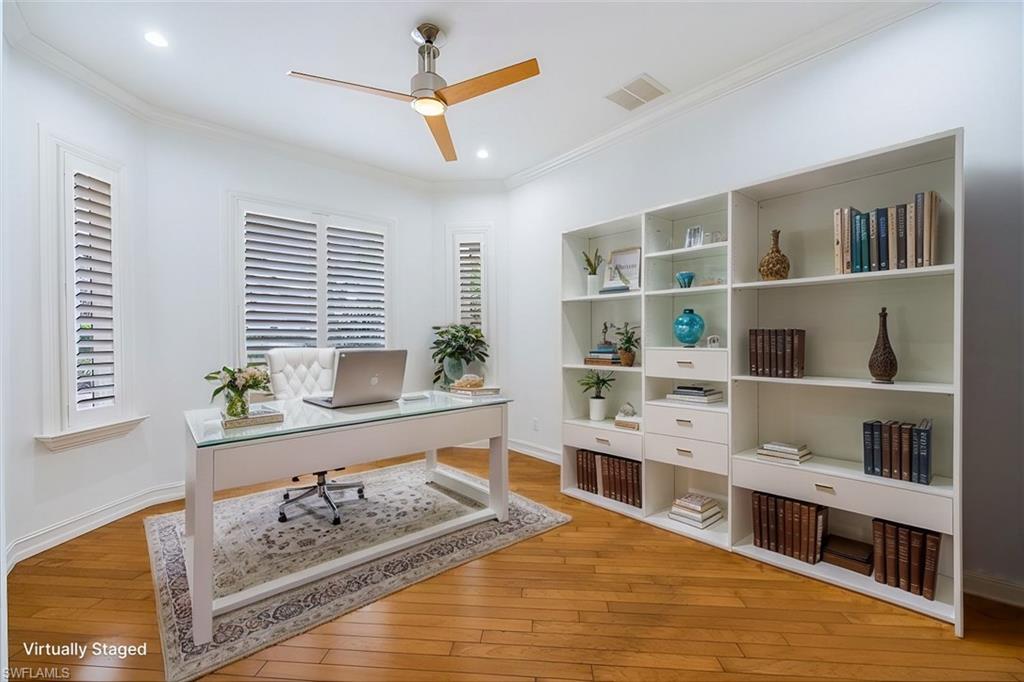 3110 Crayton Road Naples, FL 34103 - Photo 17 of 38 Virtually Staged - Den/office in the front of the home (off the front door entry).