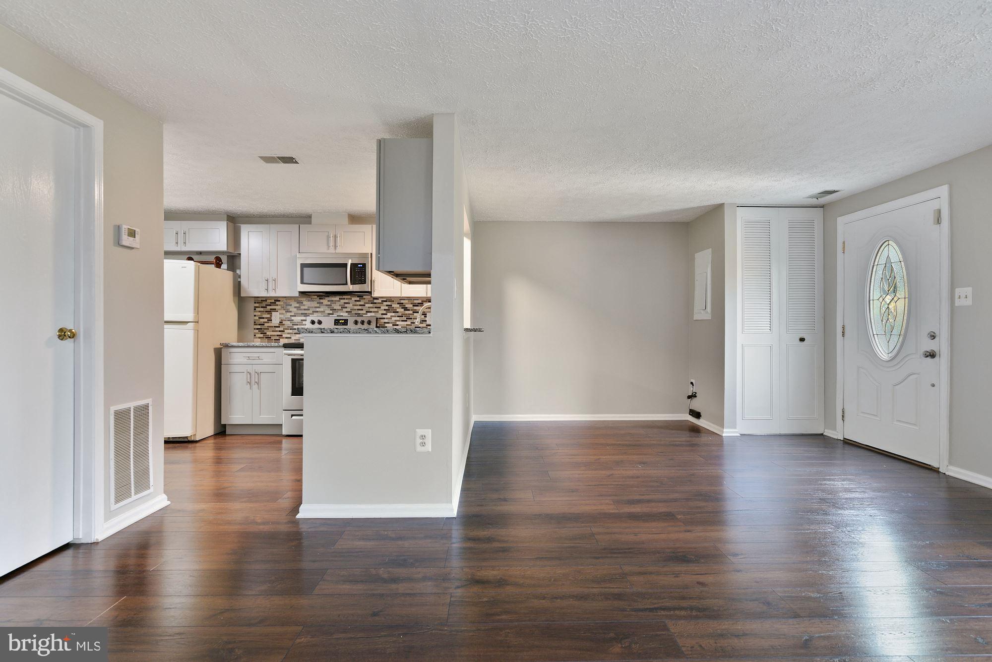 11236 Legato Way Silver Spring, MD 20901 - Photo 8 of 21 Kitchen and Living Room