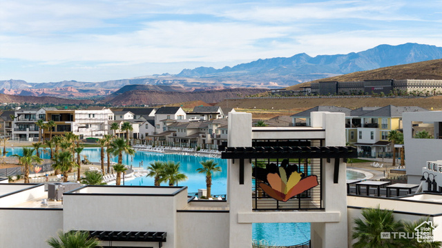 961 West Akoya Pearl Road, Unit 201 St. George, UT 84790 - Photo 39 of 67 View of pool with a mountain view and a residential view