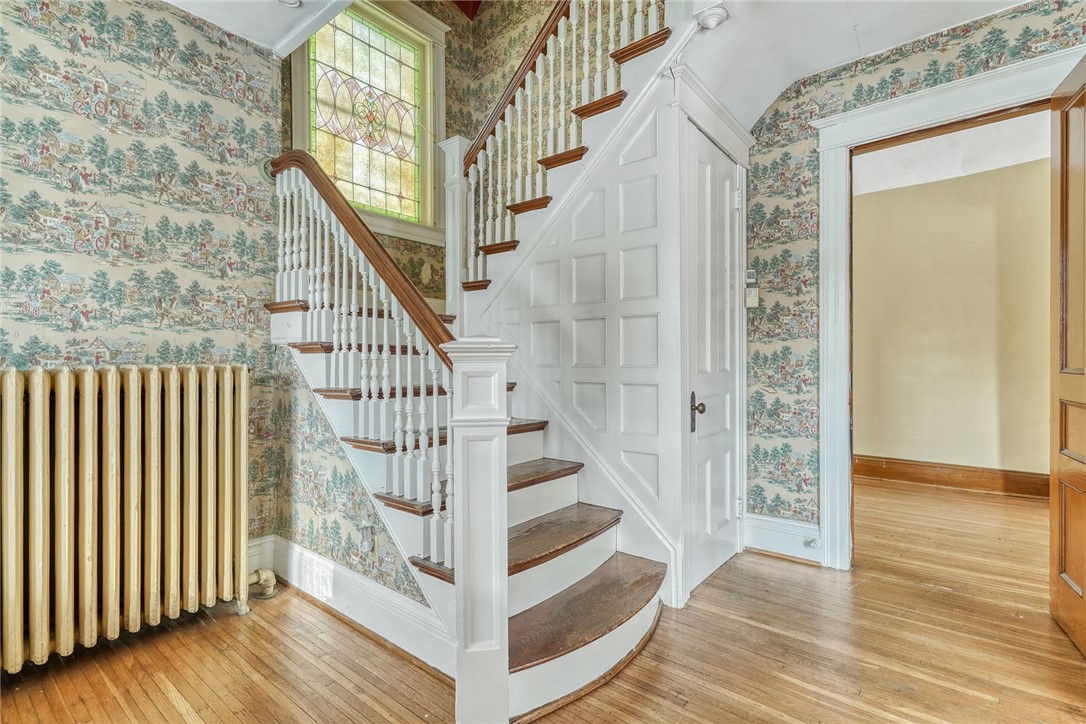 40 Stewart Street Rochester, NY 14620 - Photo 24 of 50 FOYER/STAIRCASE -BEAUTIFUL "STAINED-GLASS" WINDOW!