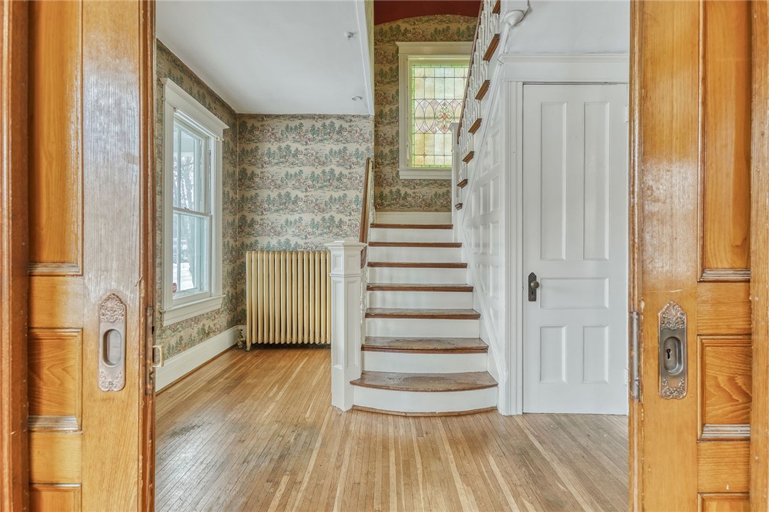 40 Stewart Street Rochester, NY 14620 - Photo 4 of 50 FOYER - VIEW FROM PARLOR - POCKET DOORS