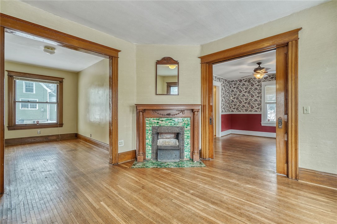 40 Stewart Street Rochester, NY 14620 - Photo 8 of 50 FORMAL LIVING RM WITH COAL FRPL-STOVE