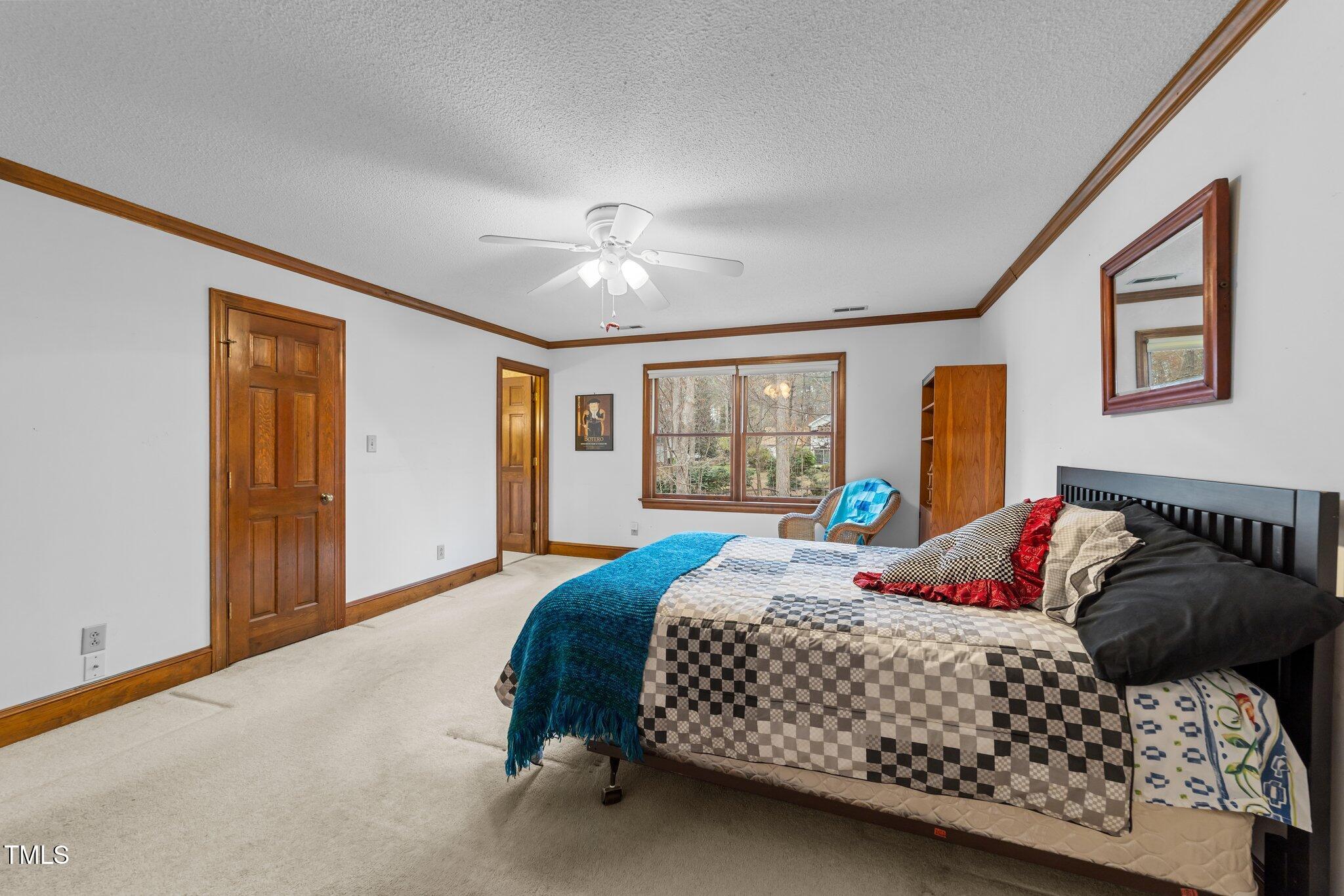 5012 Springwood Drive Raleigh, NC 27613 - Photo 24 of 44 Primary Bedroom