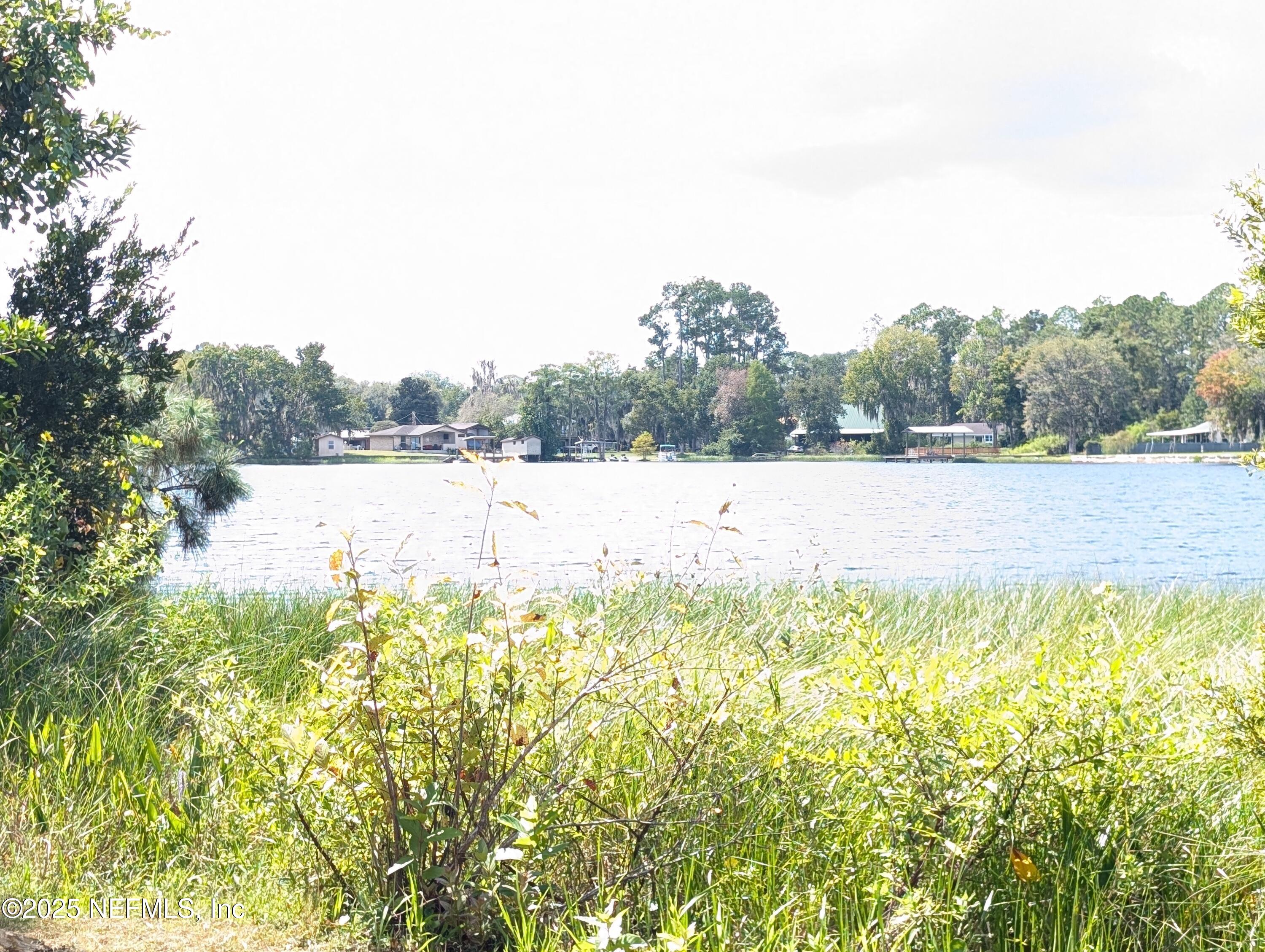 211 Ida Boulevard Interlachen, FL 32148 - Photo 12 of 12 a view of a lake view with houses in the background