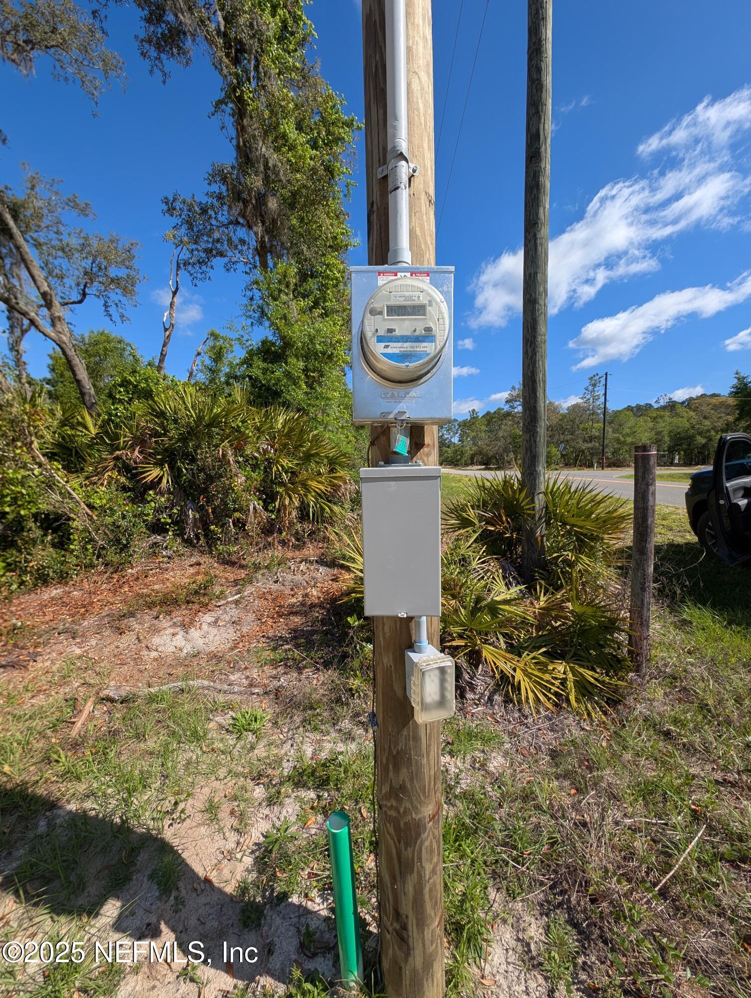 211 Ida Boulevard Interlachen, FL 32148 - Photo 7 of 12 a front view of a house with a yard and garage