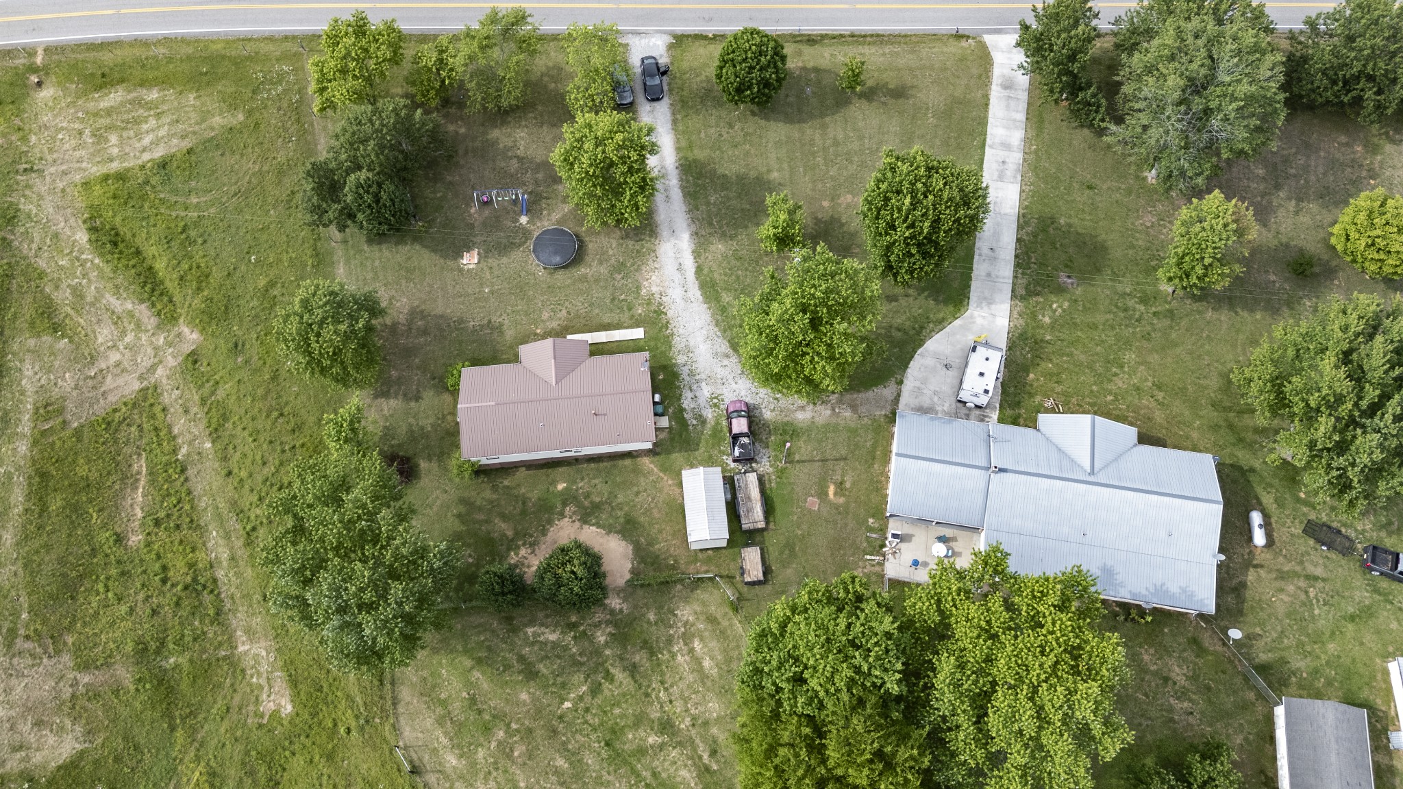 421 Shady Grove Road Flintville, TN 37335 - Photo 32 of 33 an aerial view of a house with a yard and a fountain