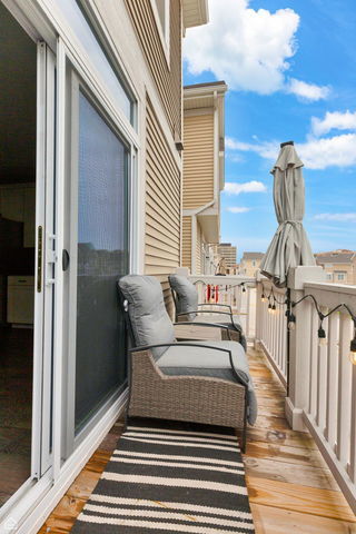 809 Lee Street Des Plaines, IL 60016 - Photo 9 of 18 a view of a balcony with two chairs