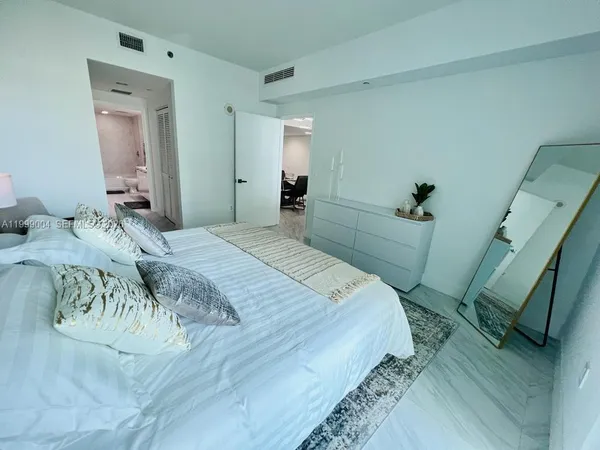 a vase of flowers sitting on a table