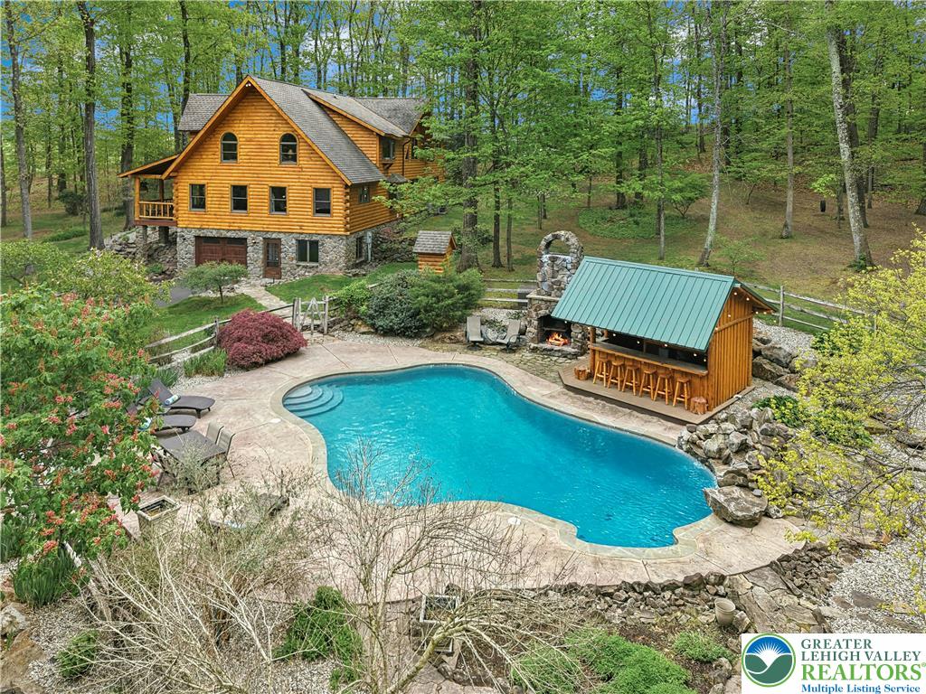 294 Nockamixon Road Kintnersville, PA 18930 - Photo 4 of 58 a aerial view of a house with swimming pool
