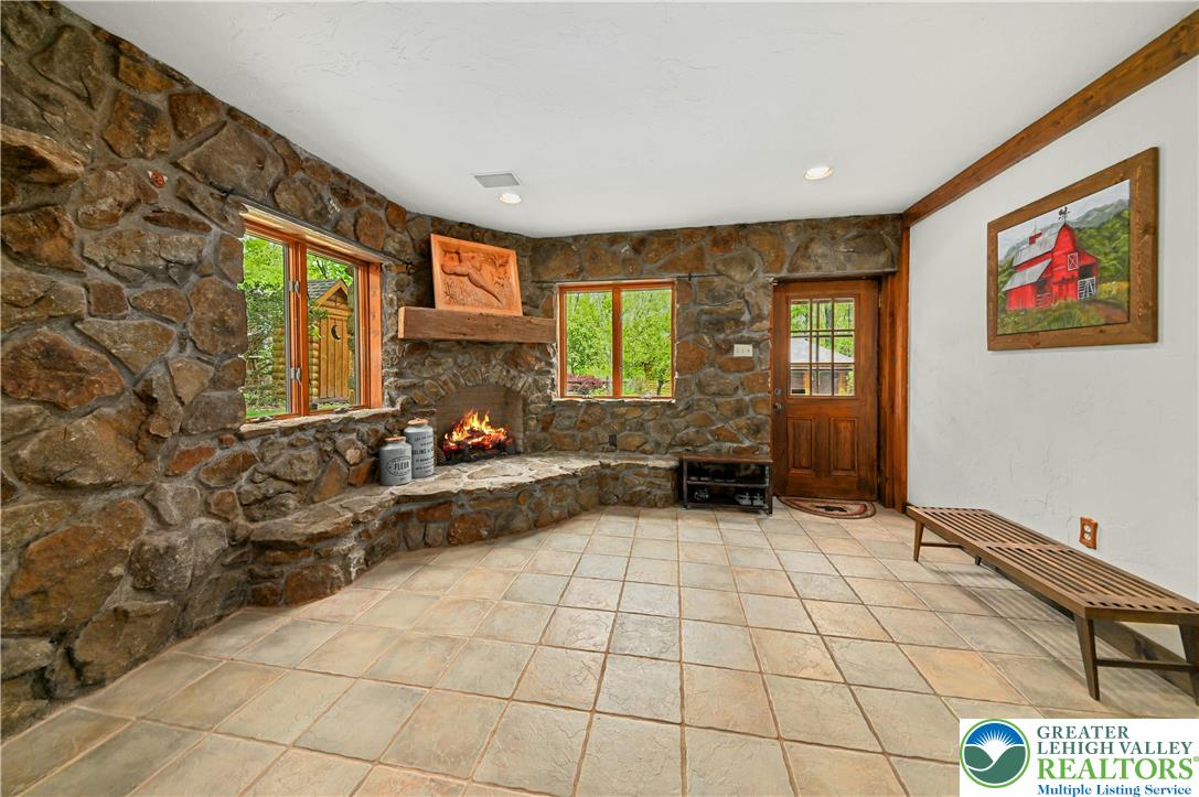 294 Nockamixon Road Kintnersville, PA 18930 - Photo 42 of 58 a view of a livingroom with furniture window and outside view