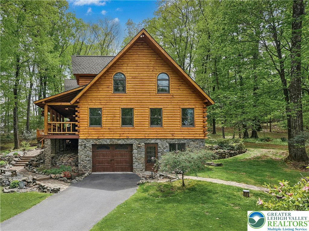 294 Nockamixon Road Kintnersville, PA 18930 - Photo 44 of 58 a front view of a house with a yard