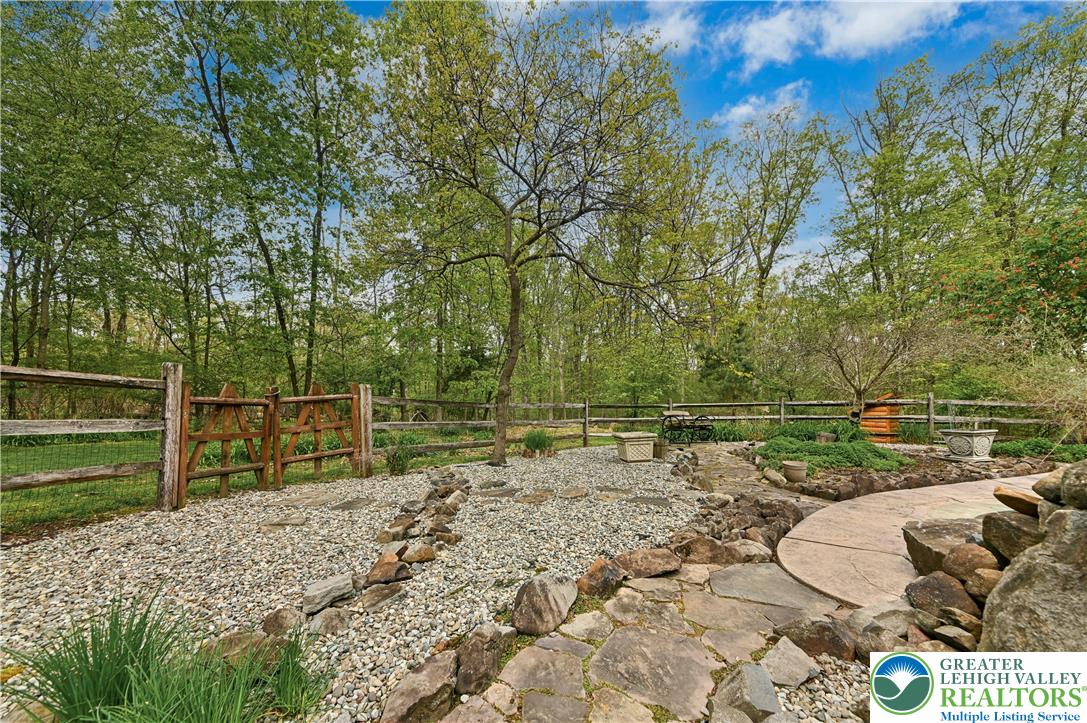 294 Nockamixon Road Kintnersville, PA 18930 - Photo 51 of 58 a view of a backyard with wooden fence