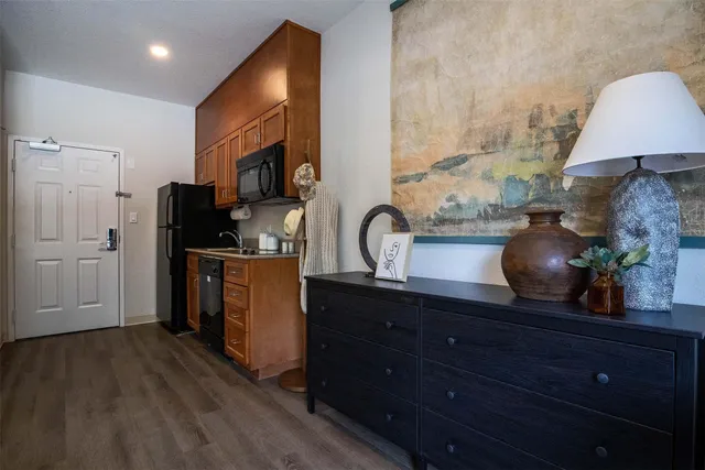 a bedroom with a bed and furniture