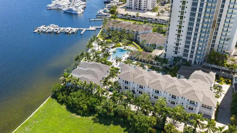 a front view of a white building with entryway