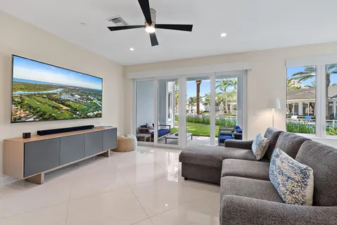 a view of a room with furniture and a yard