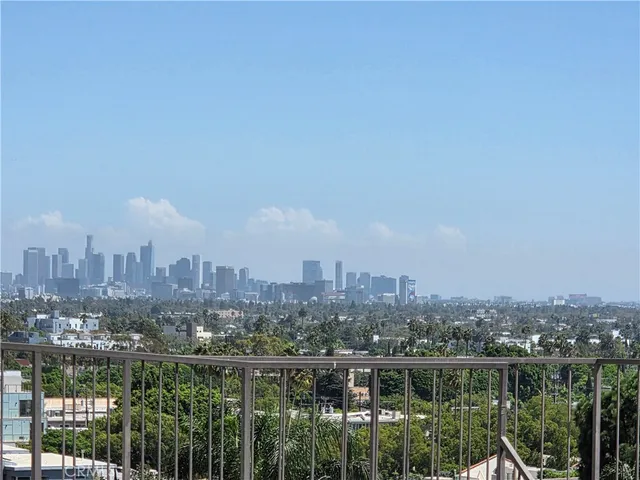 a view of a city with tall buildings