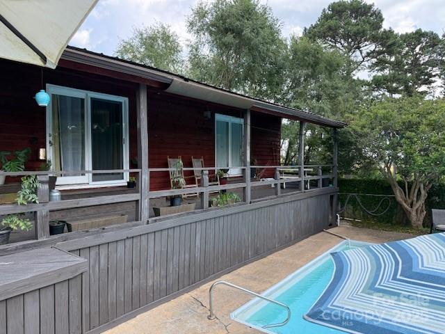 3319 Humphries Road Shelby, NC 28150 - Photo 20 of 41 a view of a chair and tables in the balcony