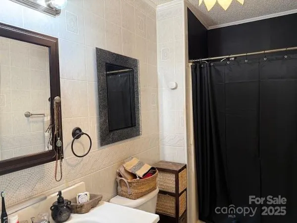 a view of house with backyard outdoor seating and green space