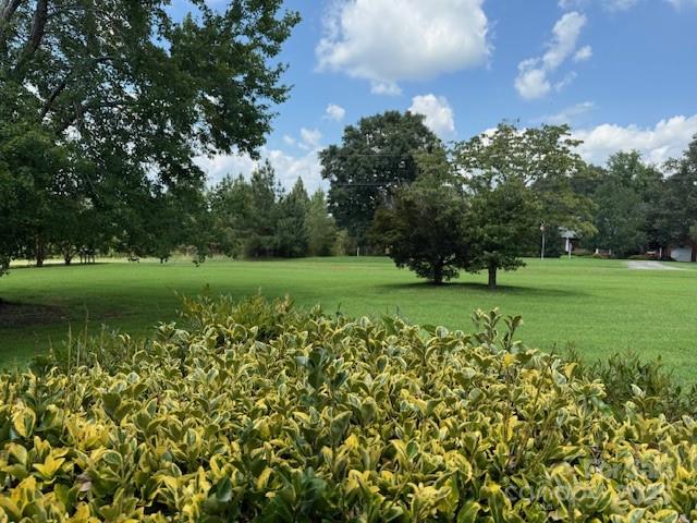 3319 Humphries Road Shelby, NC 28150 - Photo 32 of 41 a view of a golf course with a lake