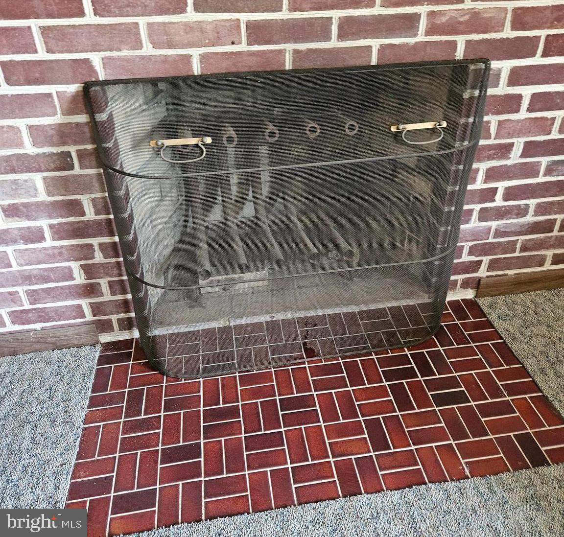 3014 Benson Mill Road Upperco, MD 21155 - Photo 11 of 19 1 of 2 fireplace with brick and mantels