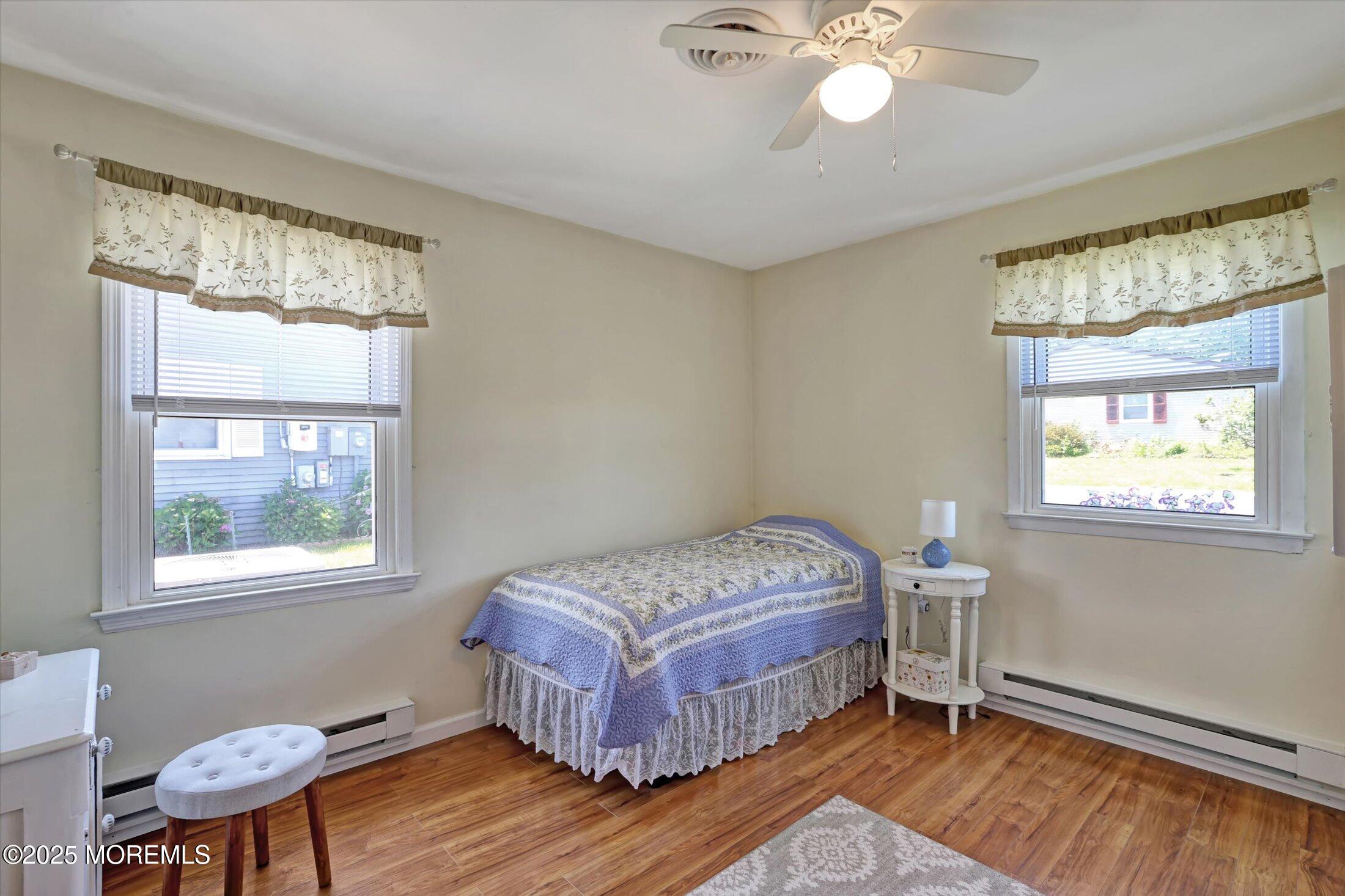 17 Churchill Road, Unit 71 Whiting, NJ 08759 - Photo 24 of 29 a bedroom with a bed and a window