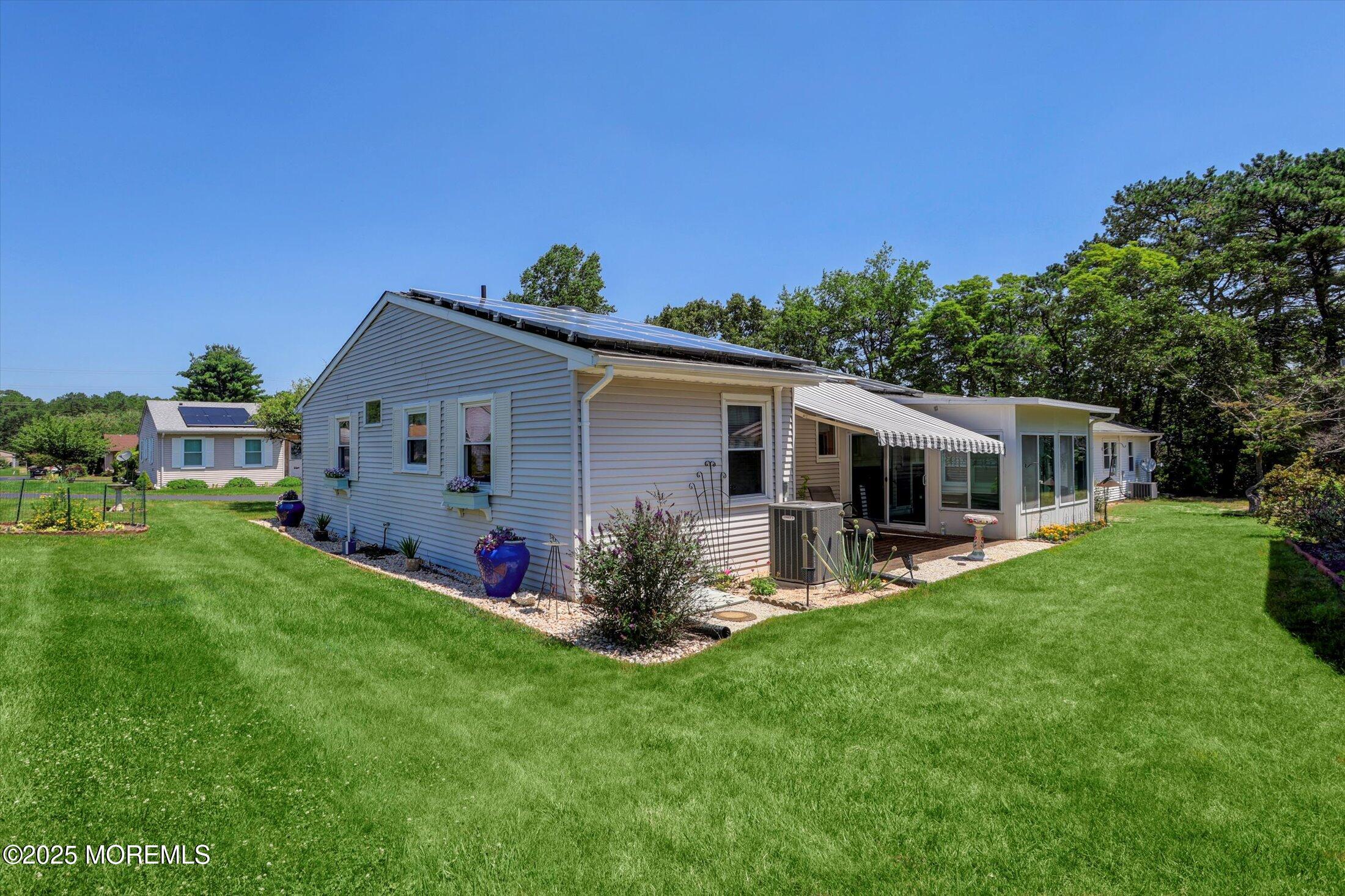 17 Churchill Road, Unit 71 Whiting, NJ 08759 - Photo 29 of 29 a front view of house with yard and green space