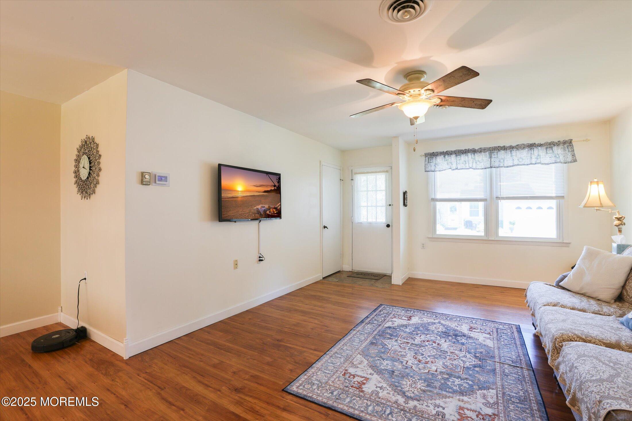 17 Churchill Road, Unit 71 Whiting, NJ 08759 - Photo 6 of 29 a living room with a couch and a window