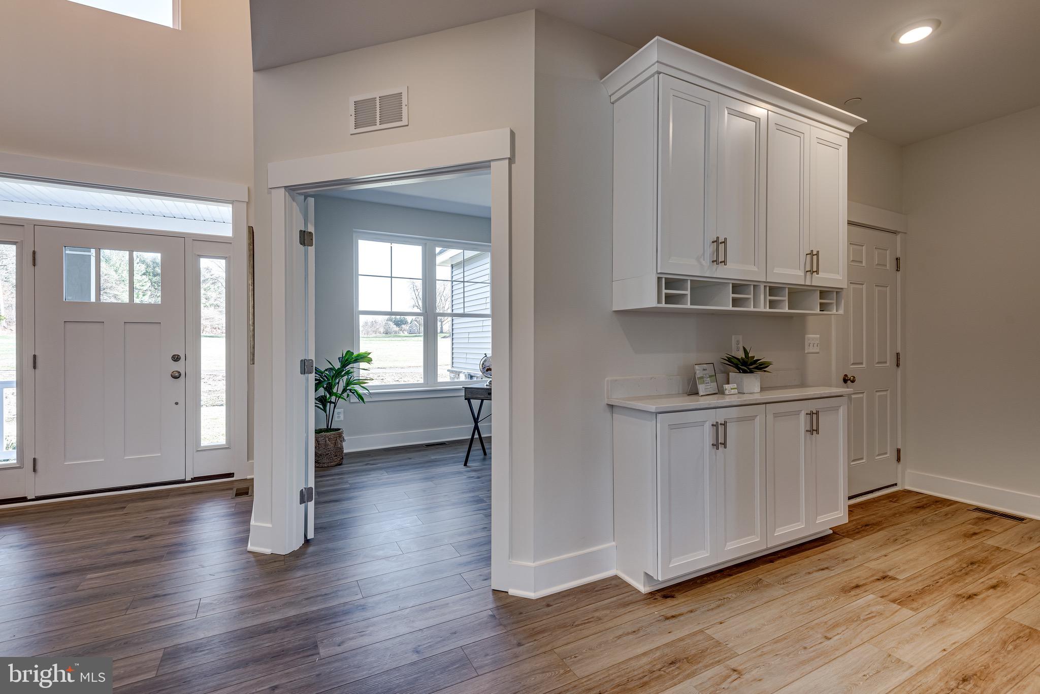 1337 German Driveway Hanover, MD 21076 - Photo 11 of 51 a view of kitchen with wooden floor electronic appliances and window