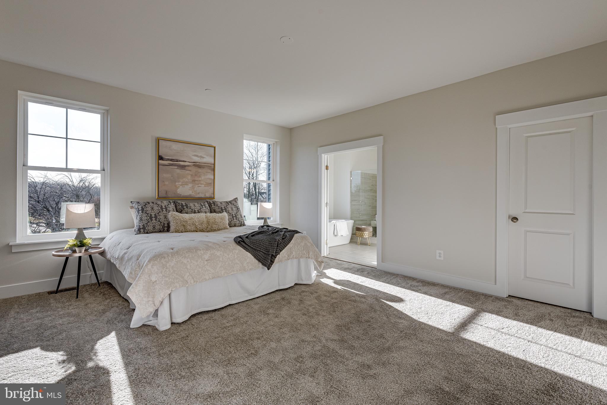 1337 German Driveway Hanover, MD 21076 - Photo 29 of 51 a bedroom with bed and a large window