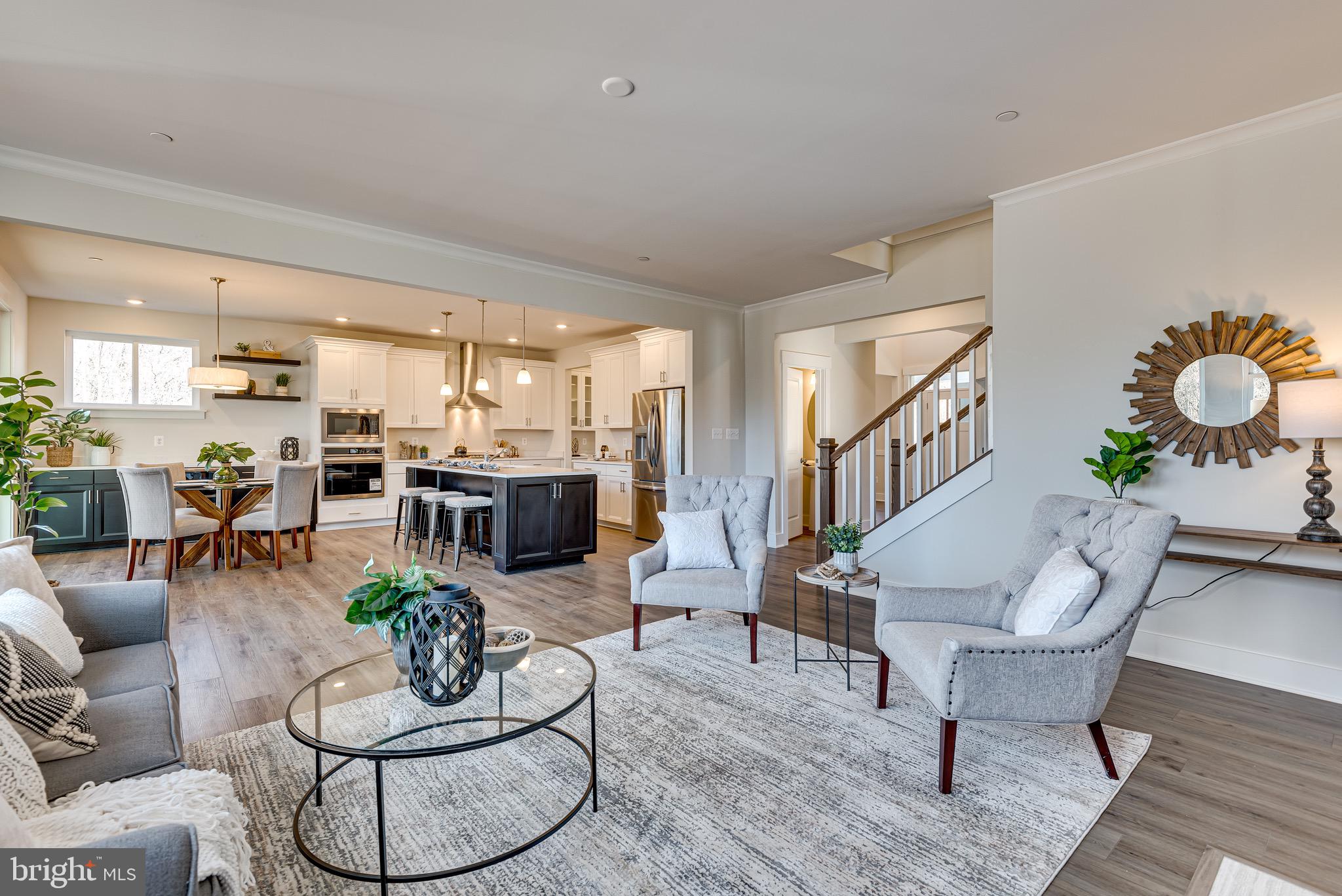 1337 German Driveway Hanover, MD 21076 - Photo 3 of 51 a living room with furniture kitchen view and a table
