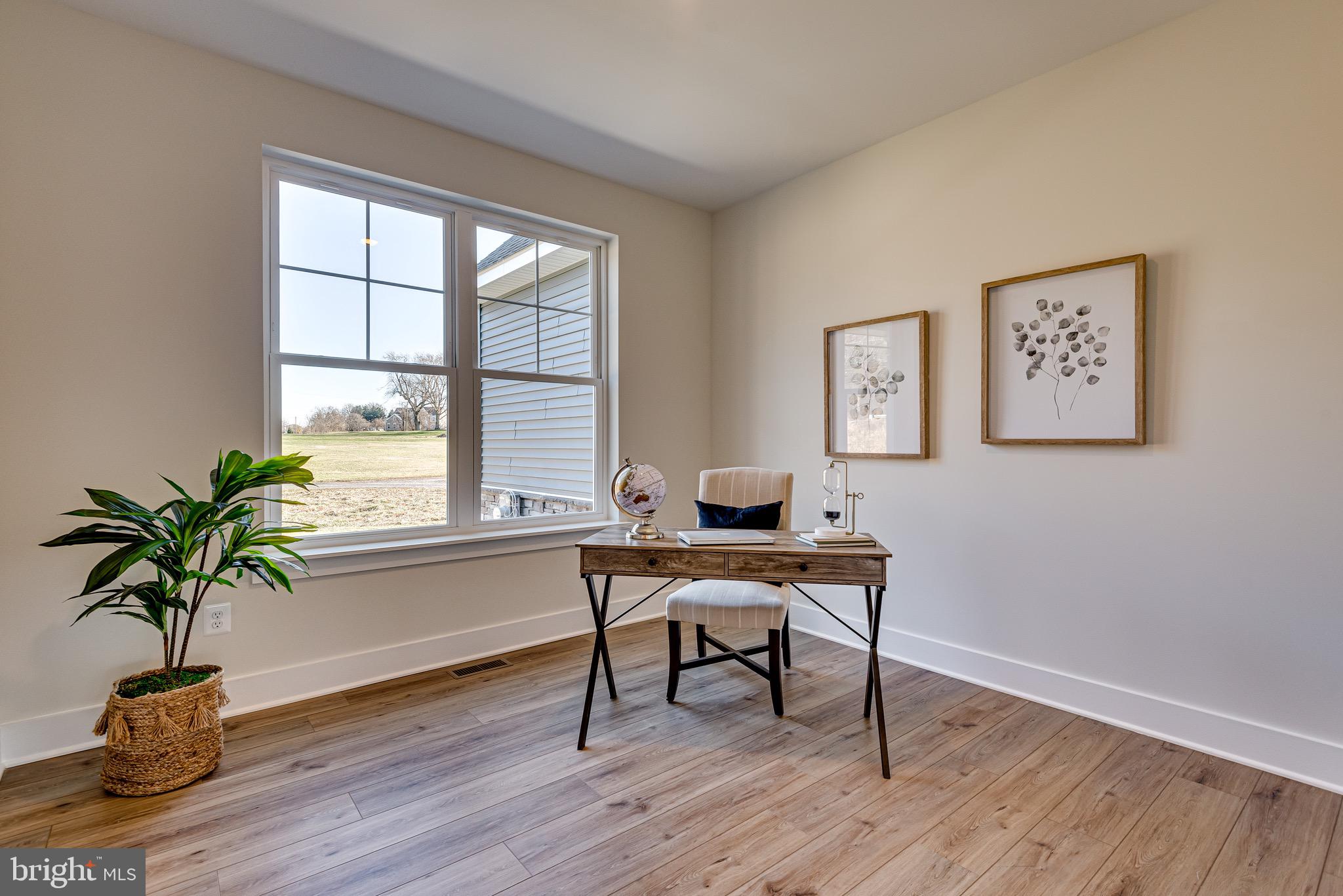 1337 German Driveway Hanover, MD 21076 - Photo 9 of 51 a view of a workspace with wooden floor and a window
