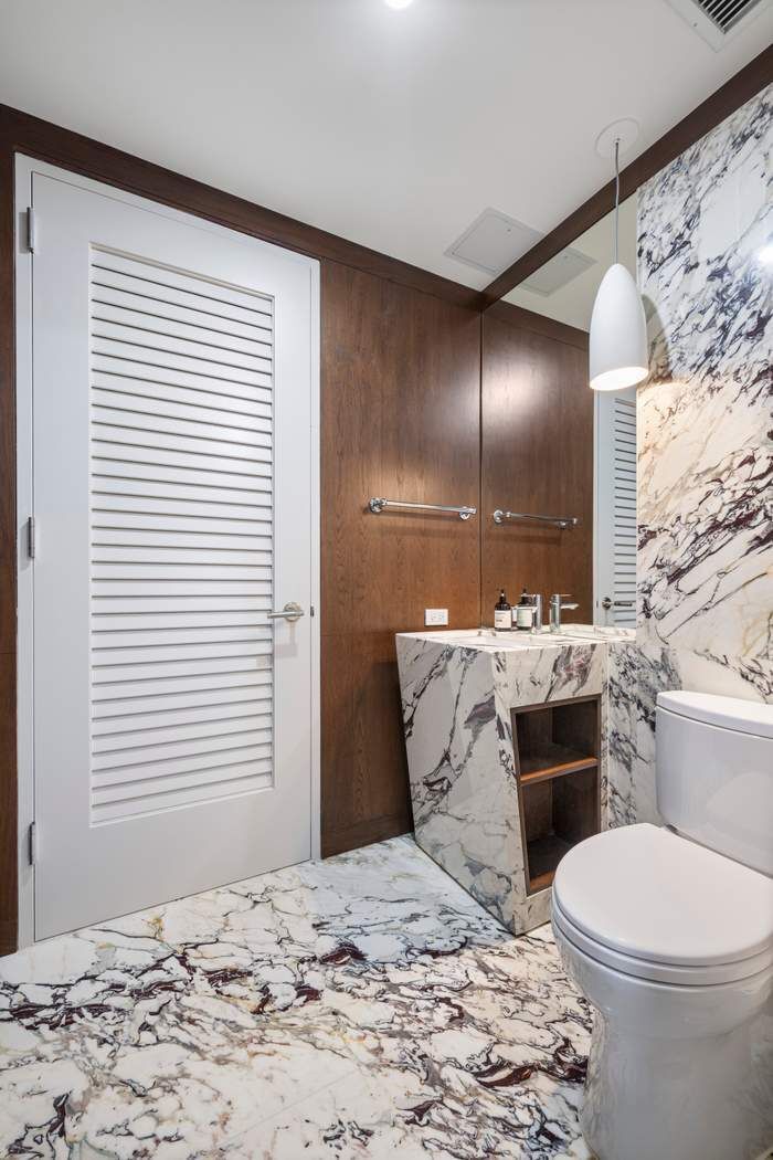 35 West 15th Street, Unit 13B Manhattan, NY 10011 - Photo 5 of 10 a bathroom with a sink and a toilet