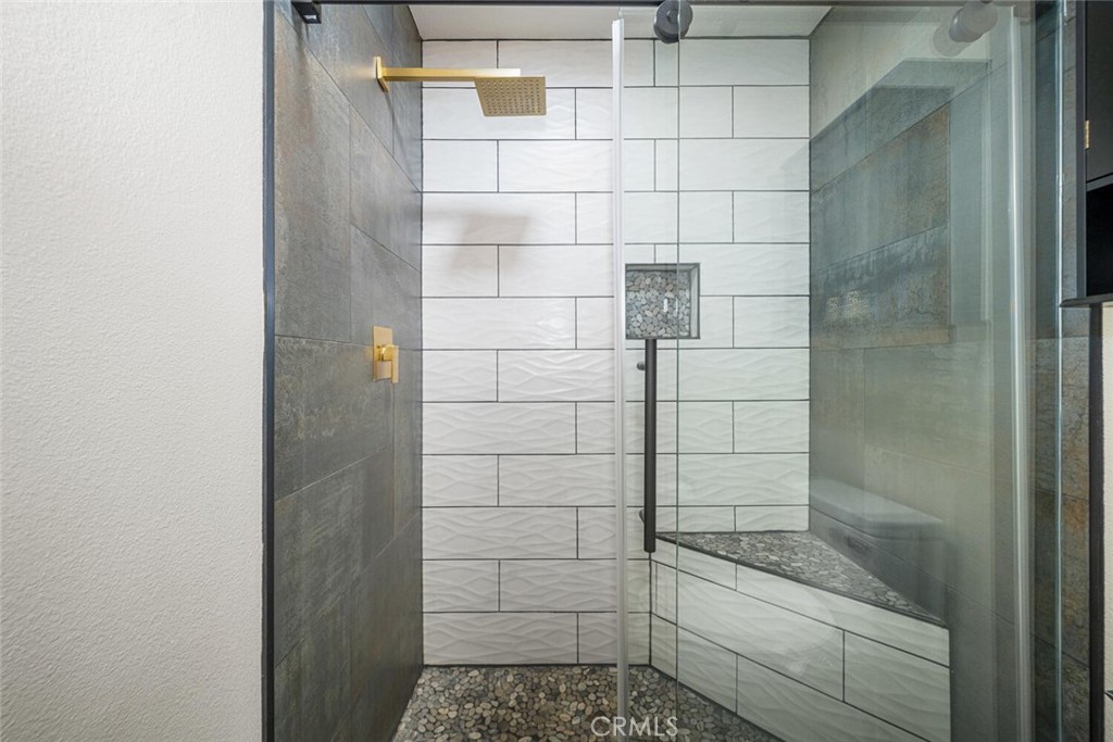 7890 East Spring Street, Unit 4W Long Beach, CA 90815 - Photo 24 of 36 a bathroom with a shower