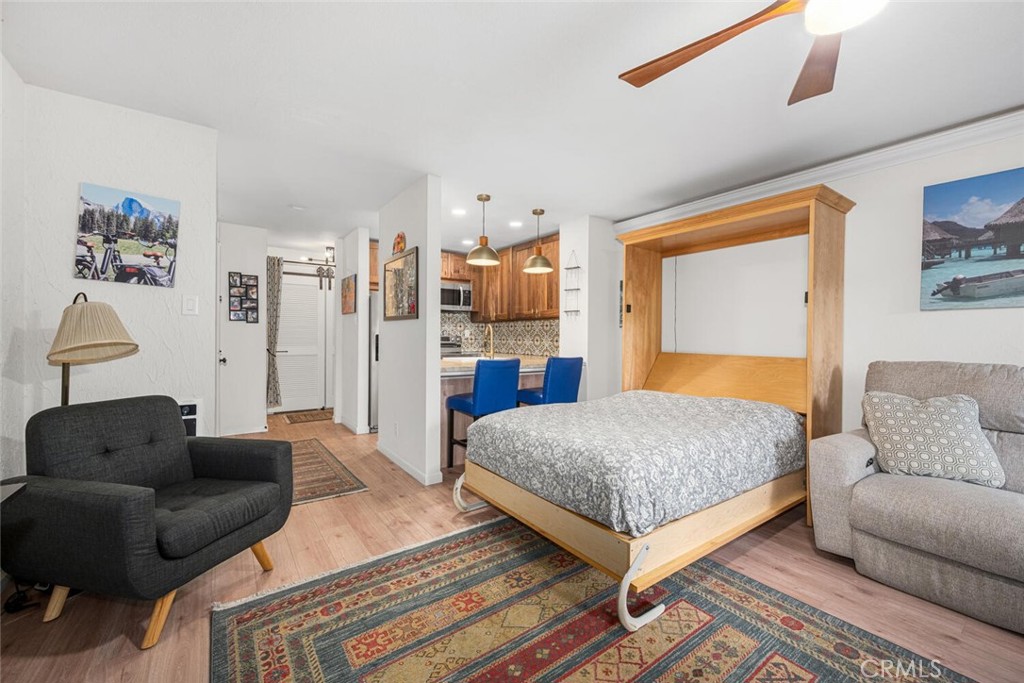 7890 East Spring Street, Unit 4W Long Beach, CA 90815 - Photo 8 of 36 a living room with furniture and a couch