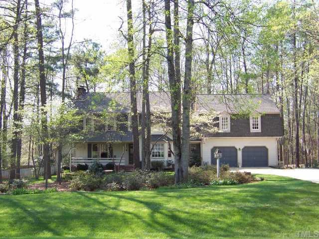 8605 Wellsley Way Raleigh, NC 27613 - Photo 1 of 1 a front view of house with yard and green space