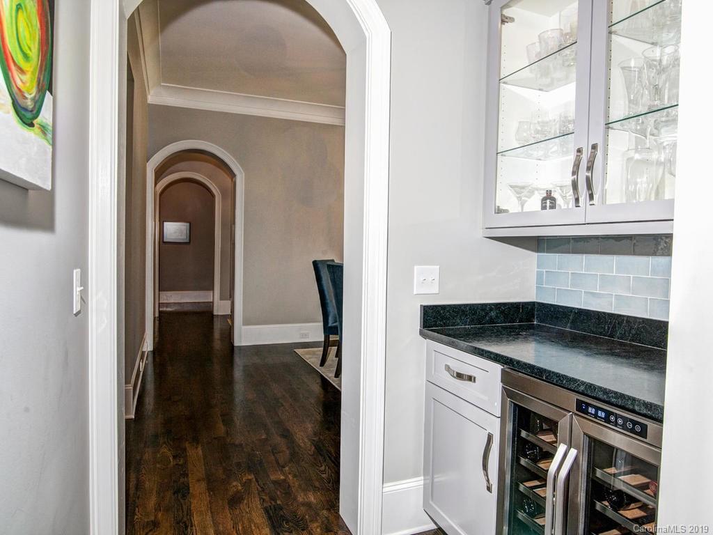 6237 Sharon Acres Road Charlotte, NC 28210 - Photo 15 of 48 a close view of a kitchen sink and a stove