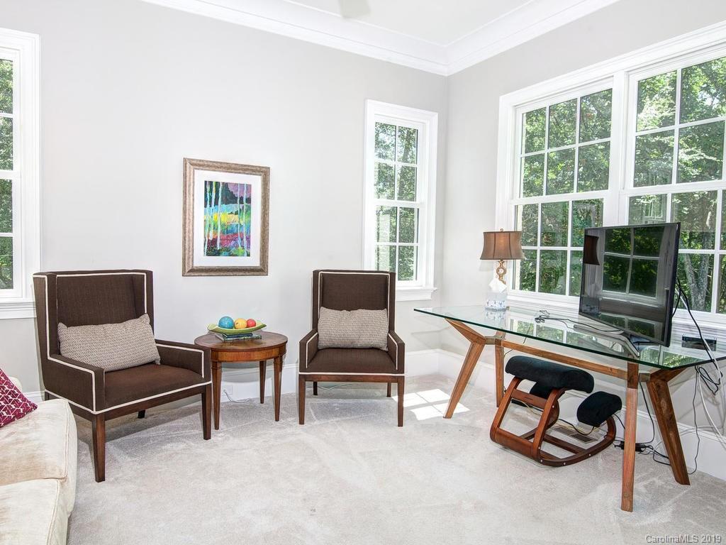 6237 Sharon Acres Road Charlotte, NC 28210 - Photo 24 of 48 a living room with furniture and a window