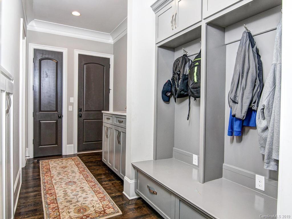 6237 Sharon Acres Road Charlotte, NC 28210 - Photo 36 of 48 a view of walk in closet with clothes and shoes